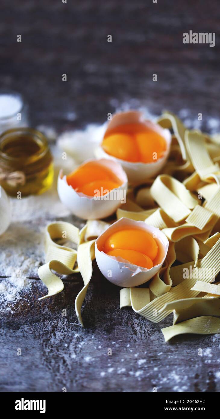Raw noodles, eggs, flour. Egg noodles Stock Photo Alamy
