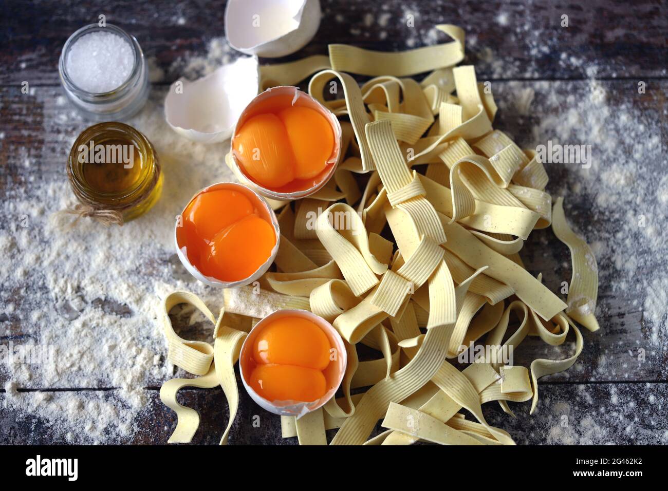 Raw noodles, eggs, flour. Egg noodles Stock Photo Alamy