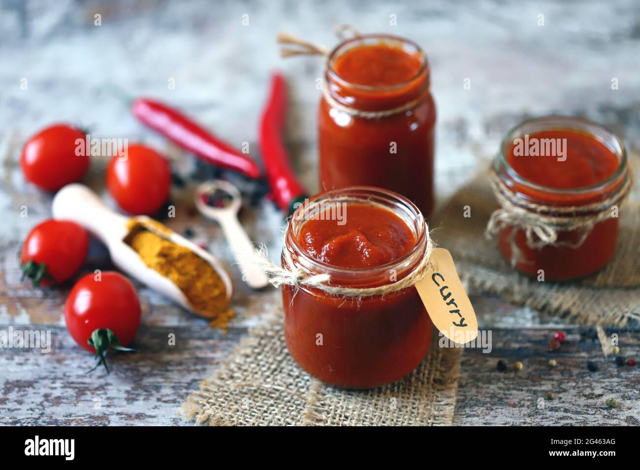 Jars of homemade curry sauce. Cooking at home. Curry Sauce. Vegan food