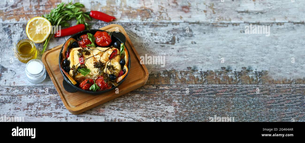 Feta cheese baked with vegetables. Keto diet. Healthly food Stock Photo