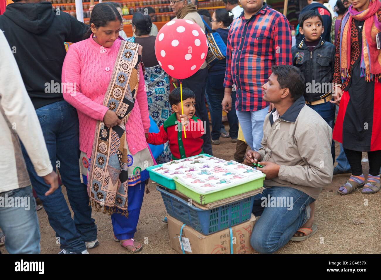 man selling traditional toys in Poush Mela, a rural historical fair of 127 years in Shantiniketan, India. Stock Photo