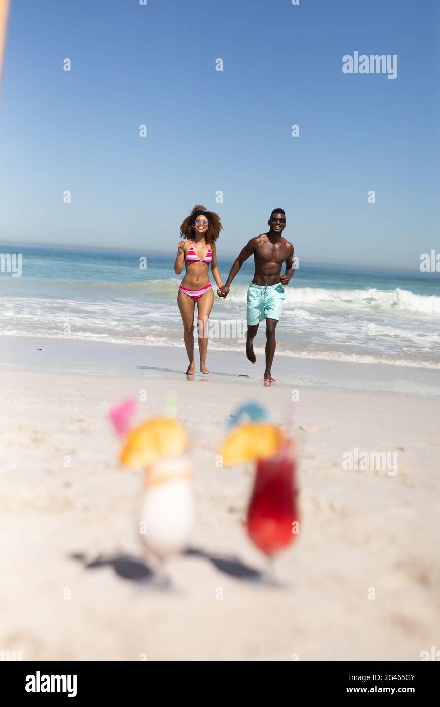 Couple tropical beach mixed race hi-res stock photography and images ...