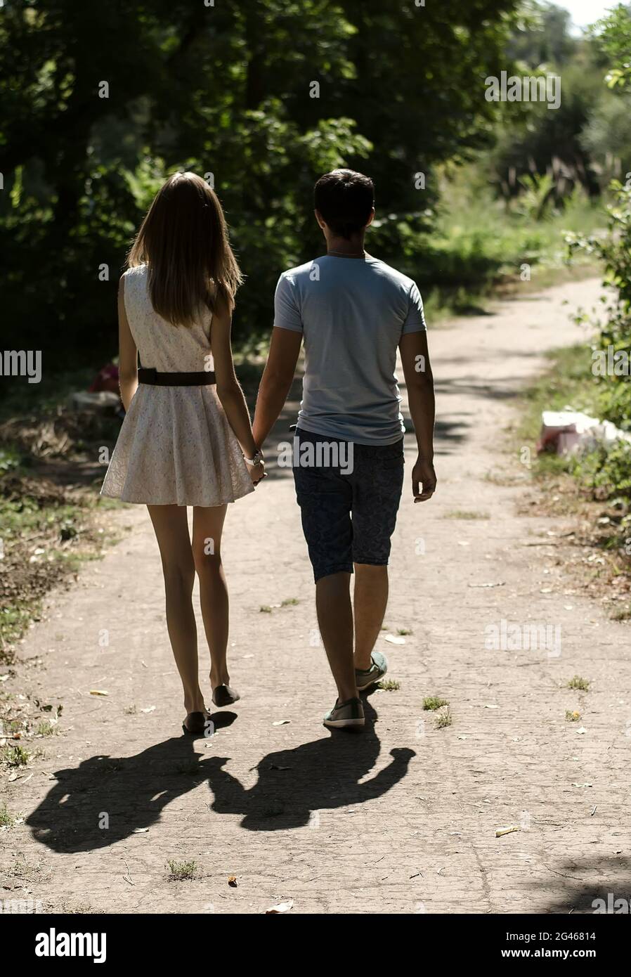 Girl And Boy Walking Away From Each Other