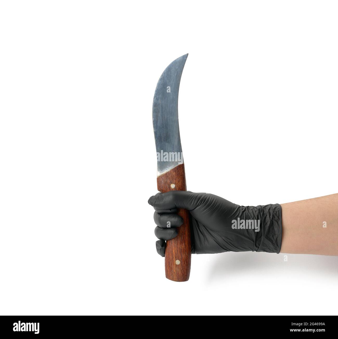 Hand in a black latex glove holds a kitchen knife on a white background