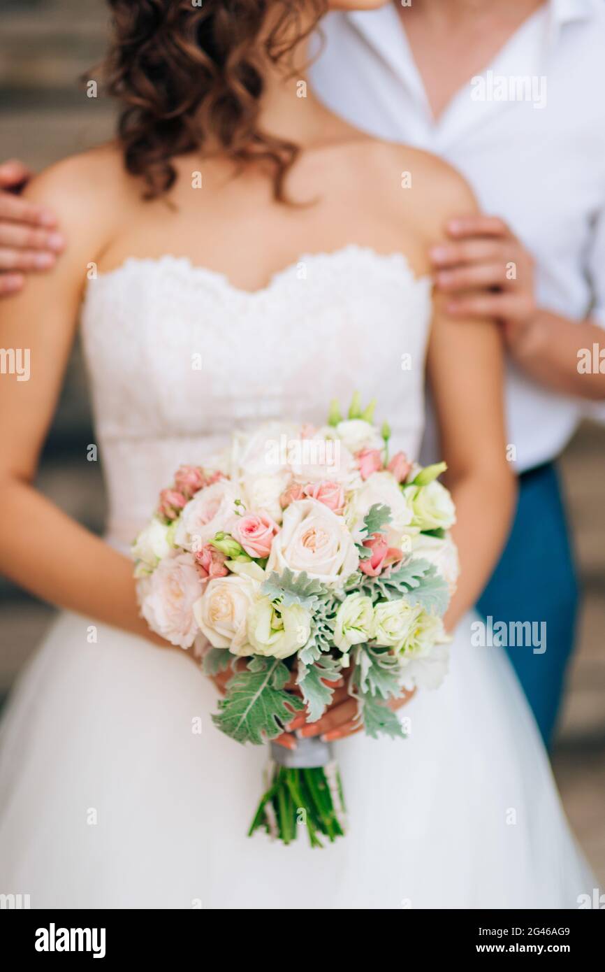 Wedding bridal bouquet of Lisianthus and Cineraria silver in the Stock Photo