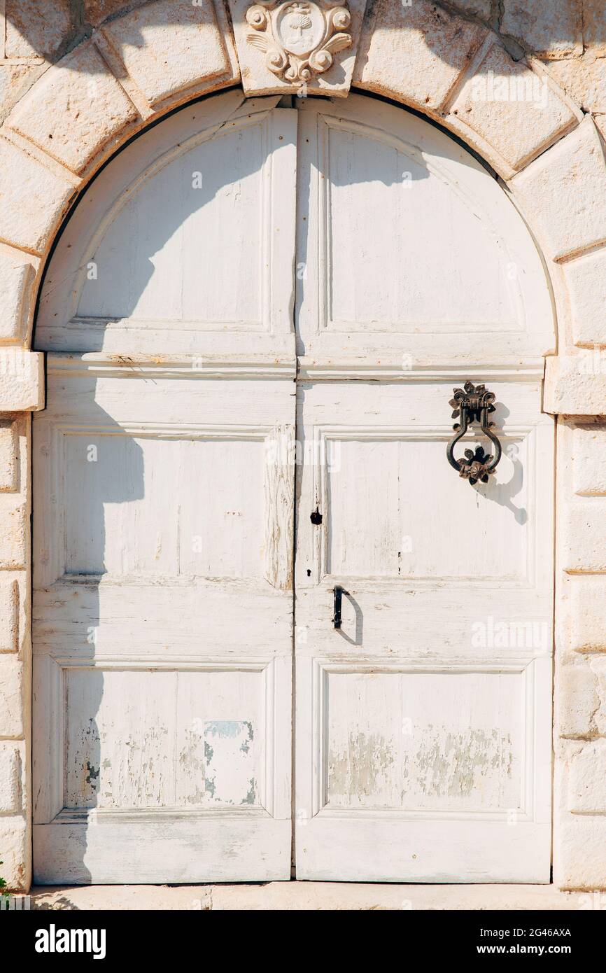 Old white doors. Wood texture Stock Photo