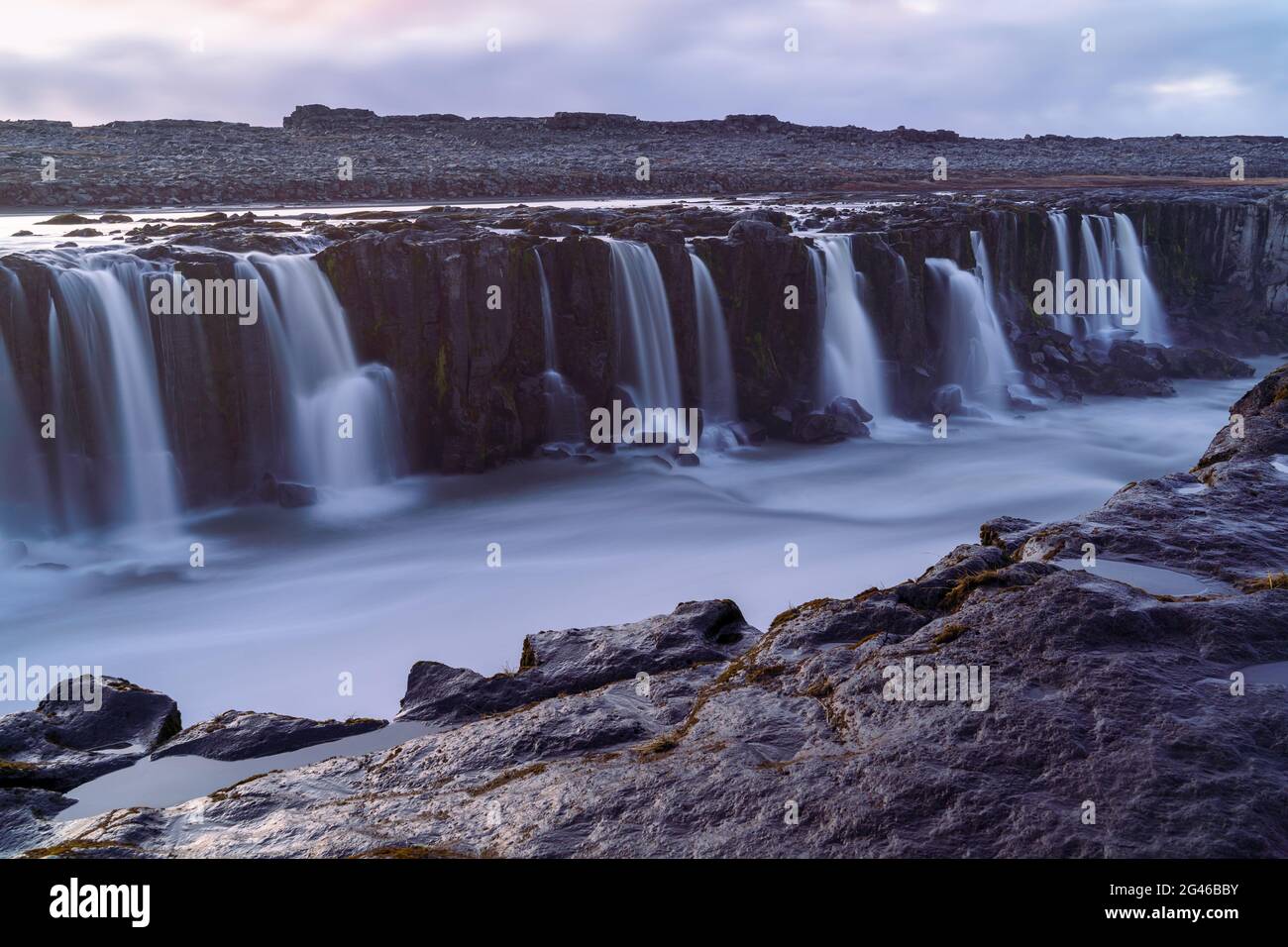 A magnificent view of the numerous streams of waterfalls flowing down to the river at the Dettifoss, Iceland Stock Photo