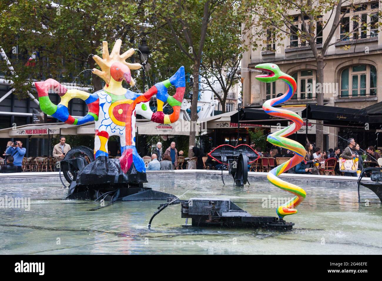 Paris, France Oct 9 2015: The Stravinsky Fountain with colorful whimsical sculptures spraying water. This is a work inspired by Igor Stravinsky and a Stock Photo