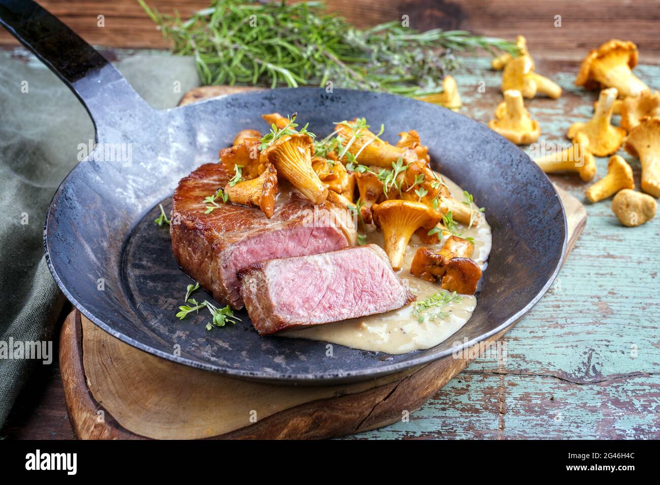 Fried dry aged wagyu roast beef steak with chanterelle in cream sauce