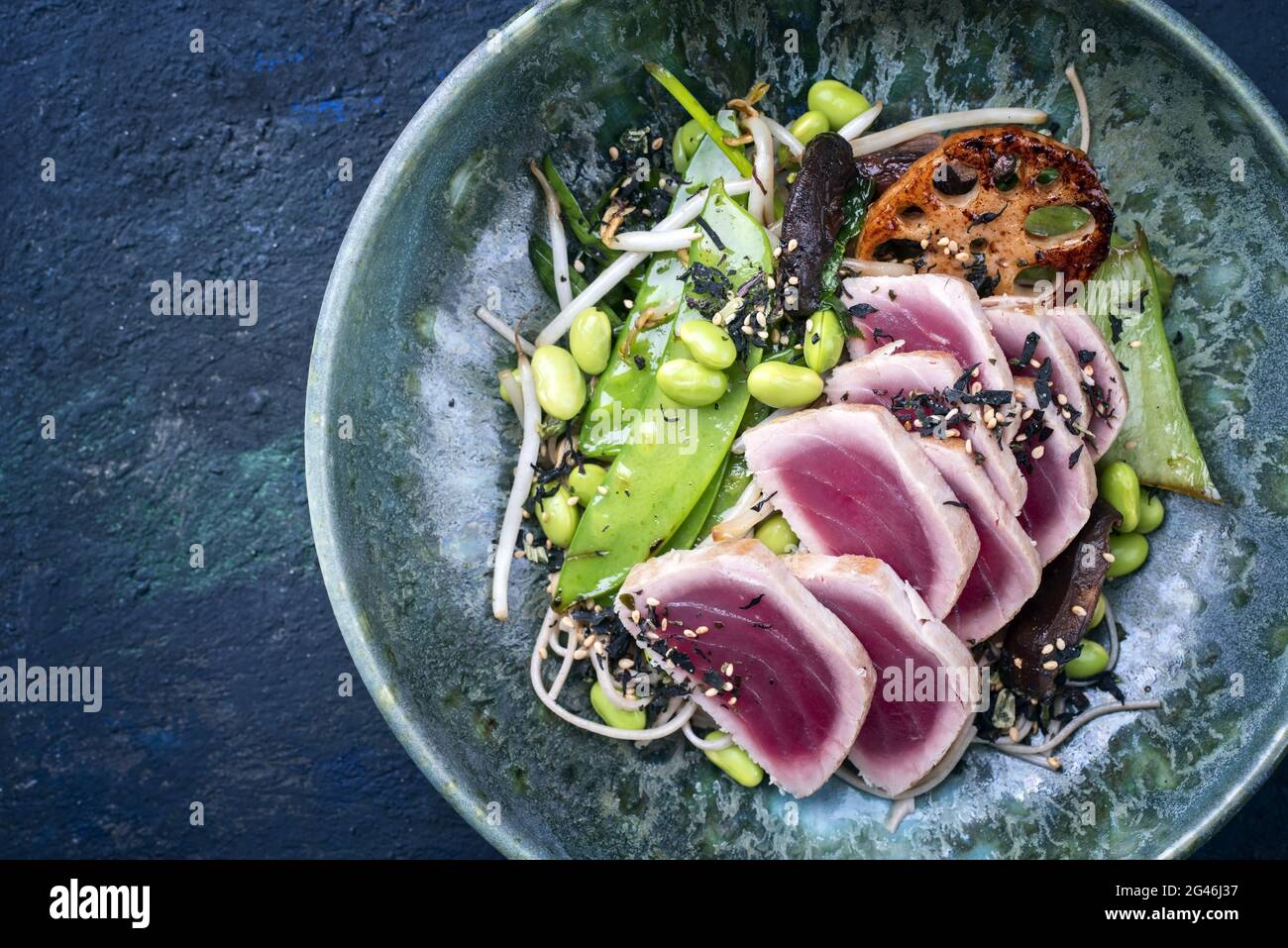 Modern style traditional Japanese gourmet seared tuna fish steak tataki