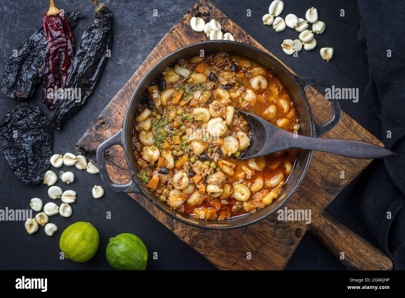 Traditional slow cooked Mexican pozole rojo soup with ground minced