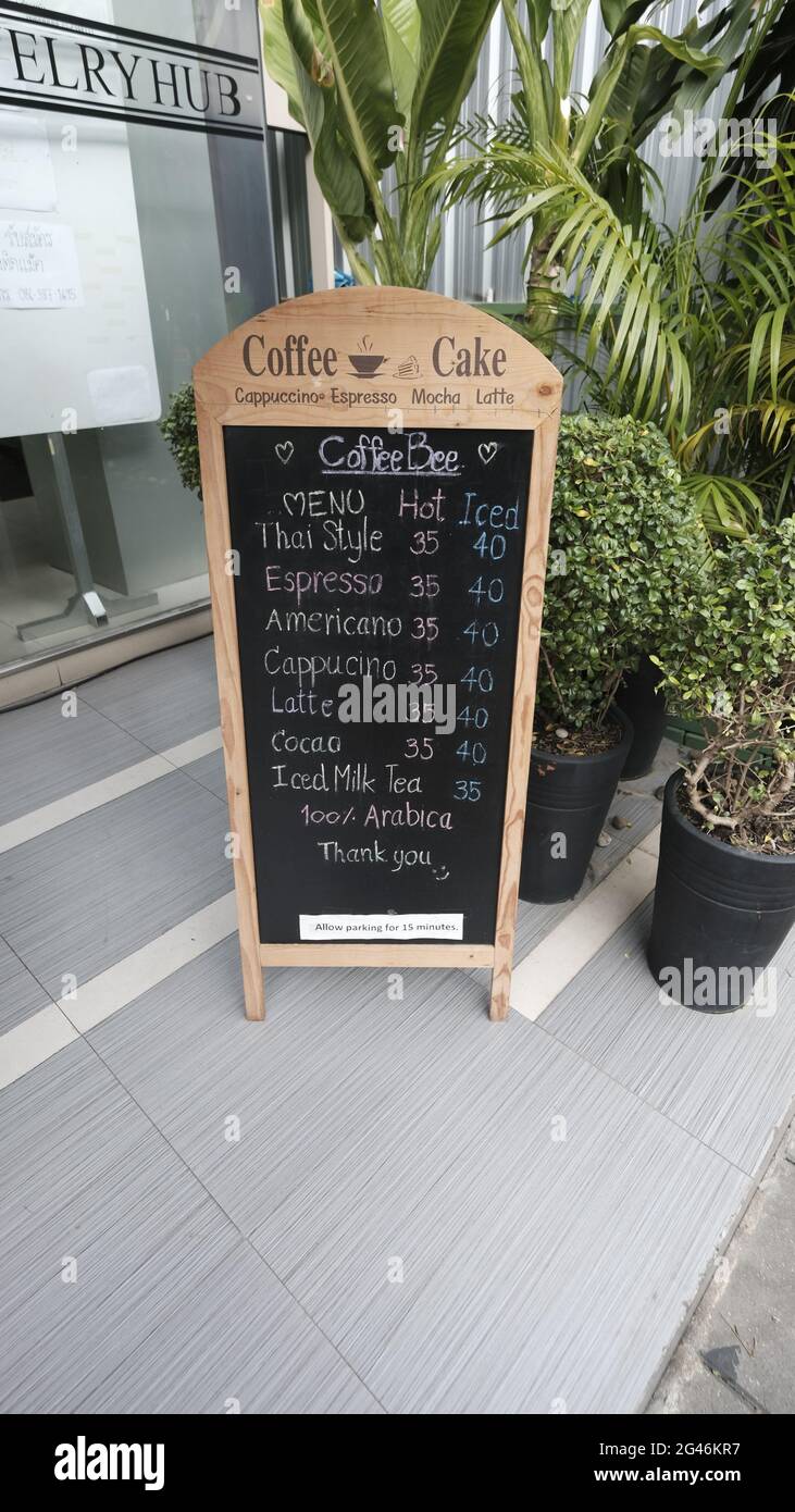 food and beverage Coffee Shop Blackboard Sign Menu Board Poster Price List on Sidewalk Silom Road Bangkok Thailand Invitation to do business Stock Photo