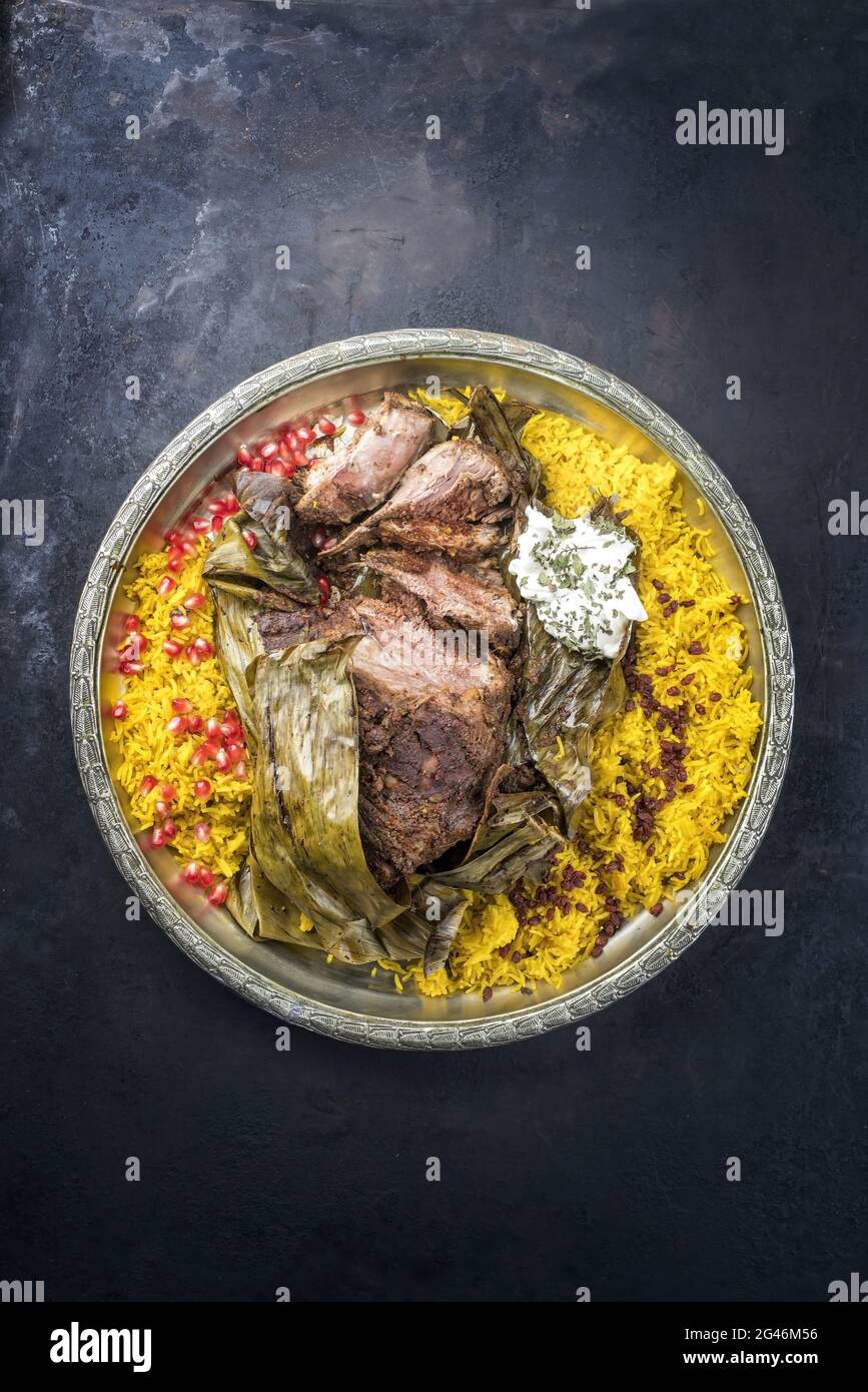 Slow cooked Omani lamb shuwa coated in rub of spices and wrapped in