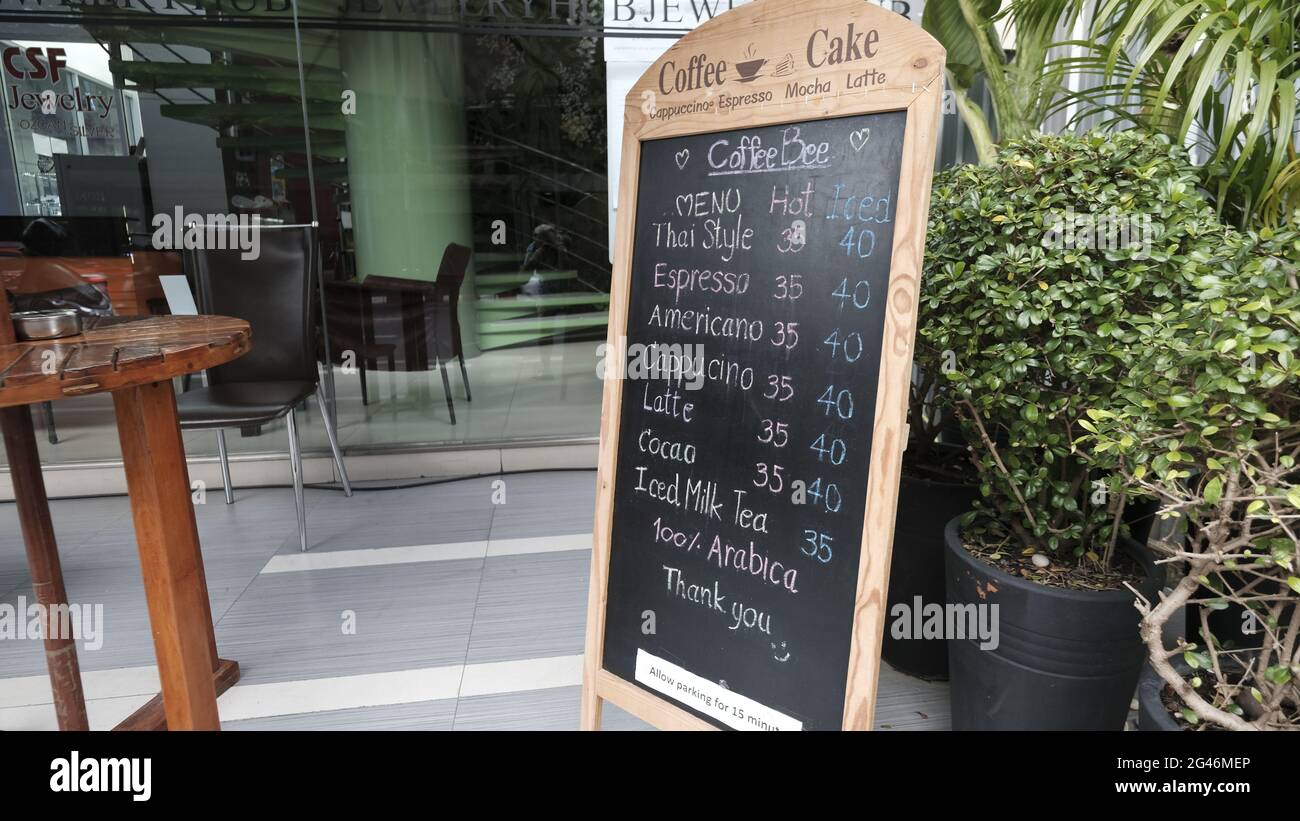 food and beverage Coffee Shop Blackboard Sign Menu Board Poster Price List on Sidewalk Silom Road Bangkok Thailand Invitation to do business Stock Photo