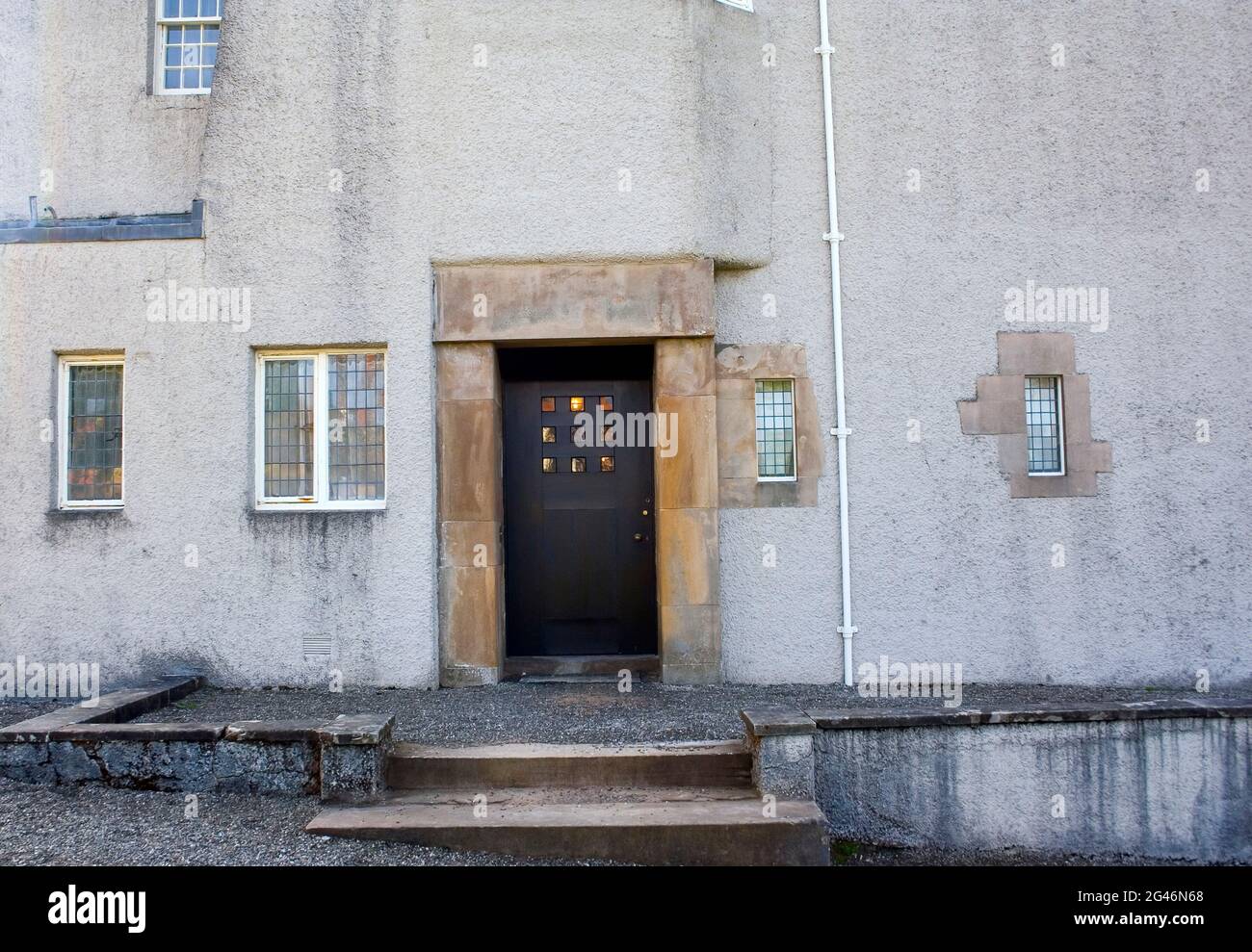 Front entrance at Hill House designed by Charles Rennie Mackintosh for the Blackie family publishers Glasgow in 1904. Helensburgh, Argyll, Scotland. Stock Photo
