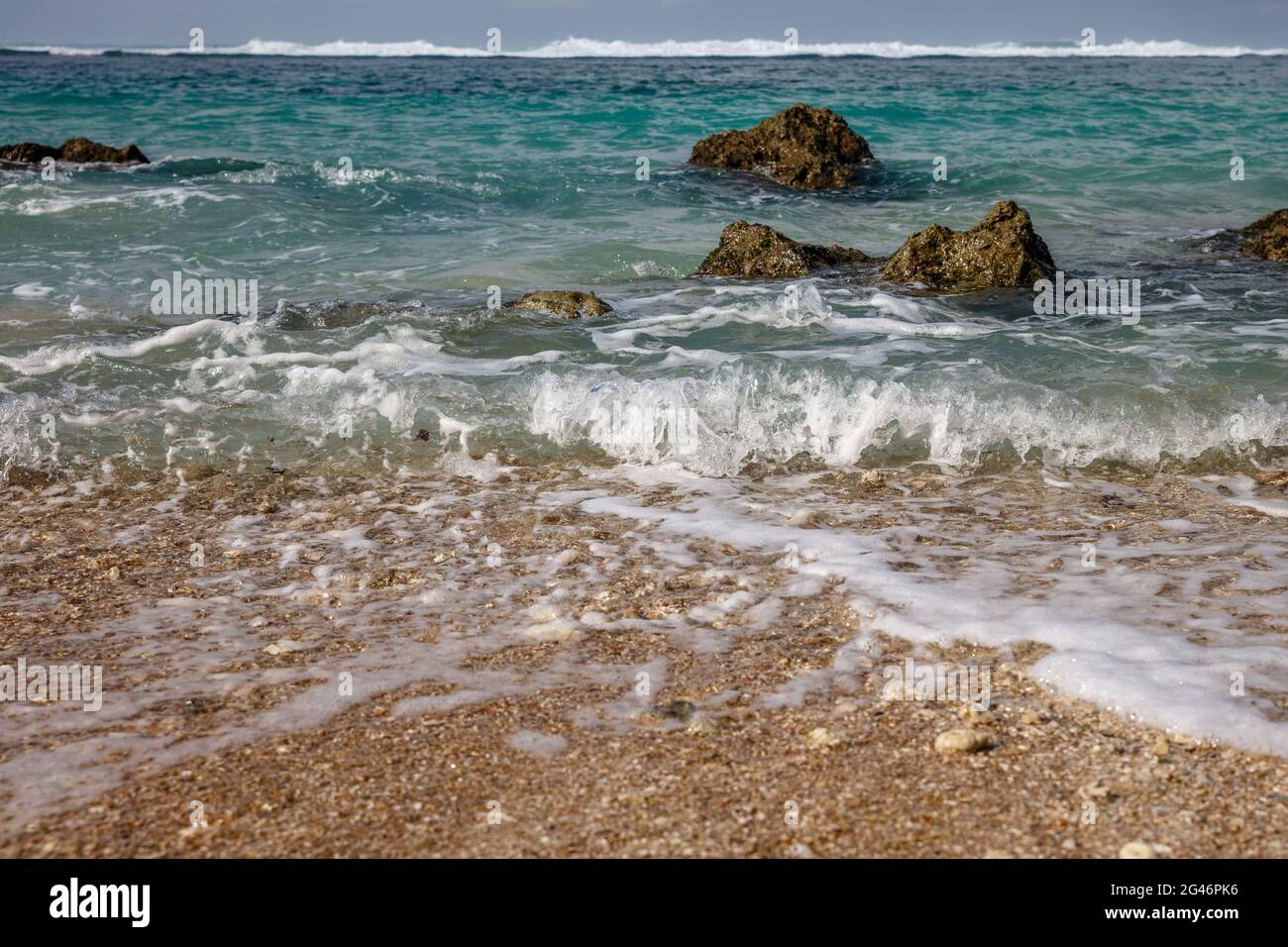 Gunung Payung Beach, Bukit, Bali, Indonesia. Turquoise water, rocks ...