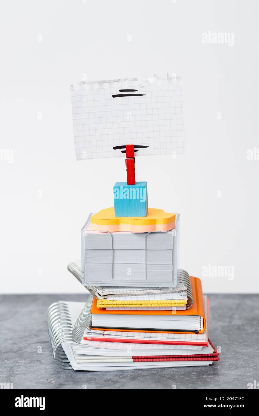 Organized Stack Note Pad, Bundle Notebooks, Neat Pile Documents, Pleasant Arrangement Writing Materials, Clean Workspace, Office Stock Photo