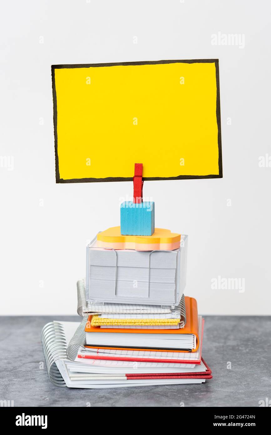 Organized Stack Note Pad, Bundle Notebooks, Neat Pile Documents, Pleasant Arrangement Writing Materials, Clean Workspace, Office Stock Photo