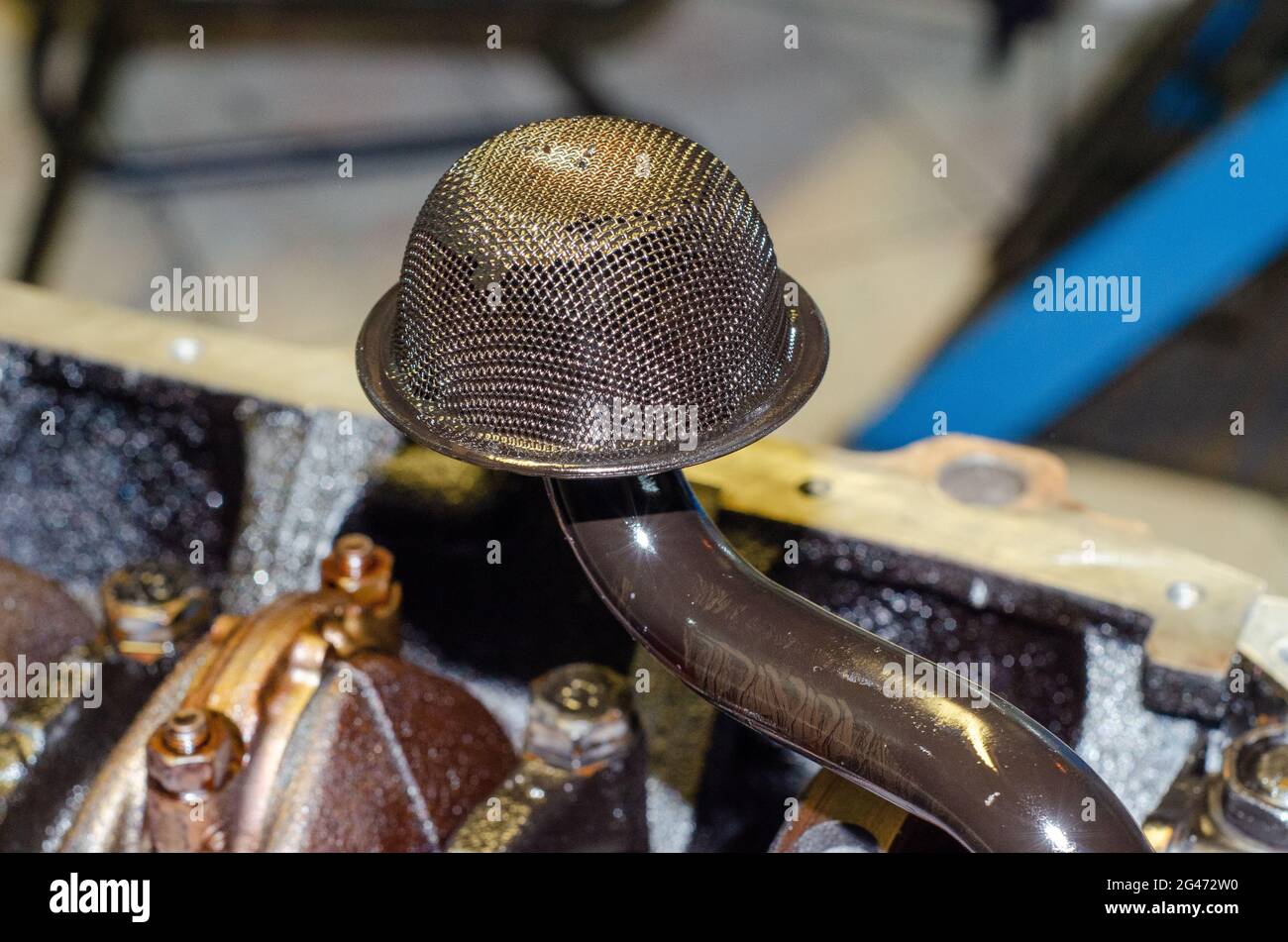 Engine pre oil filter net strainer Stock Photo Alamy