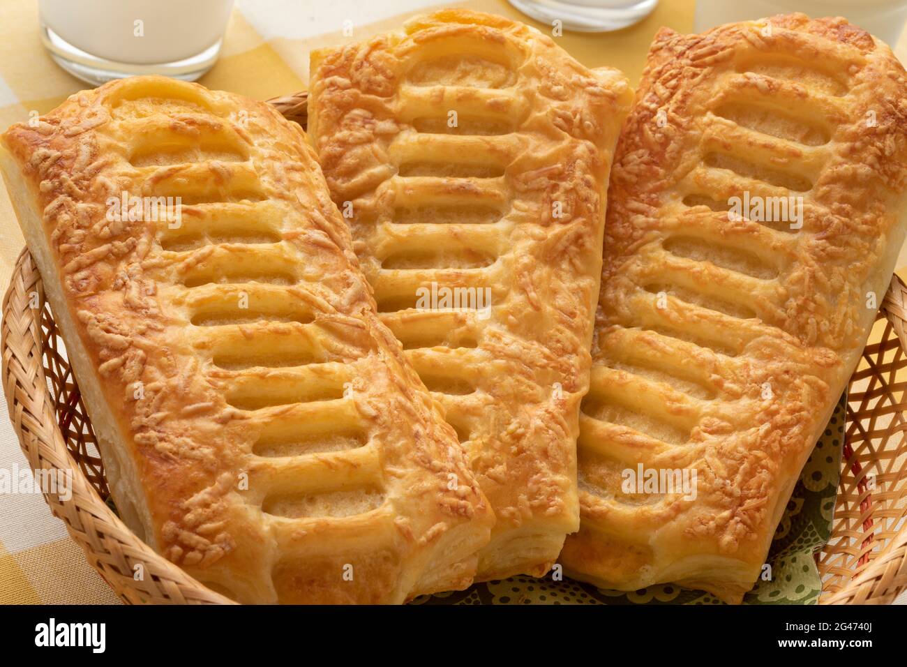 Crispy cheese puff pastry snack for lunch close up in a basket Stock Photo
