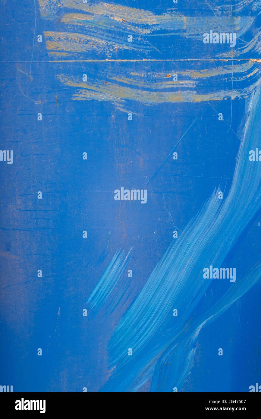 Close-up of stained, smudged and dirty blue wall. High resolution full frame abstract background. Copy space. Stock Photo