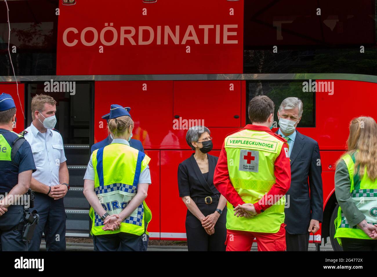 King Philippe - Filip of Belgium meets the rescue workers at the site of a collapsed building at a construction site in the Jos Smolderenstraat in the Stock Photo