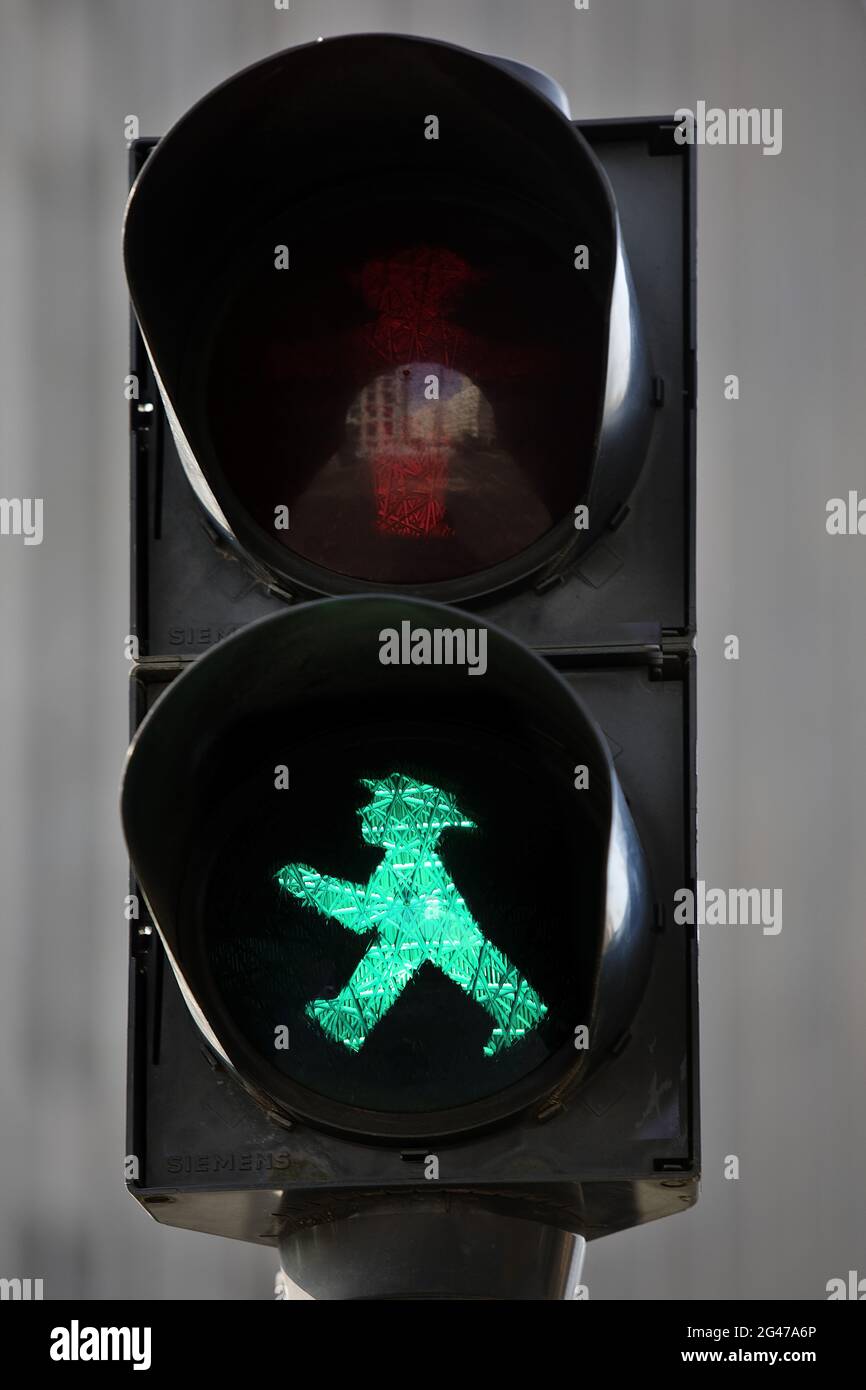 Pedestrian traffic light with green east-Ampelmaennchen Galoppo by Karl Peglau, Berlin, Germany Stock Photo
