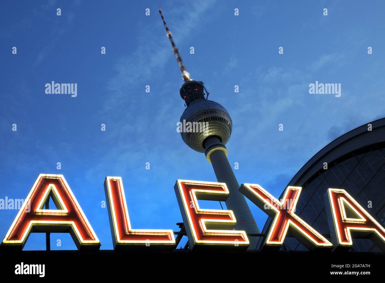 S-Bahn station Alexanderplatz with the Berlin TV tower in the evening, Alexanderplatz, Berlin Stock Photo