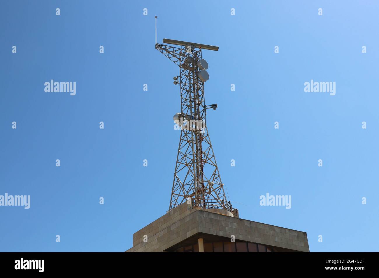 Maritime telecommunications antenna and port surveillance Stock Photo