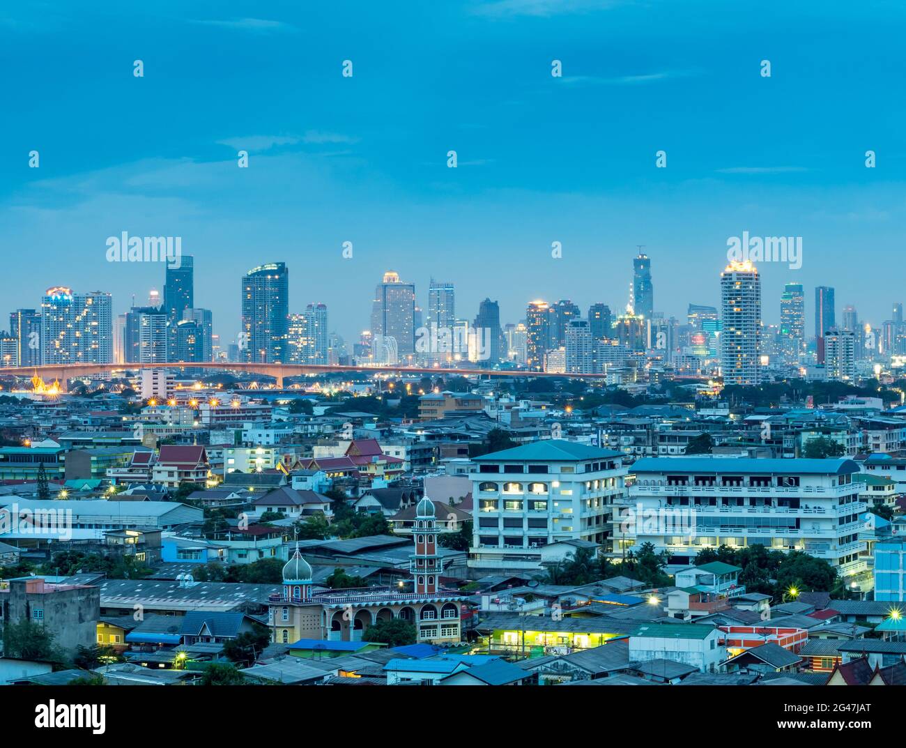 BANGKOK - AUGUST 13: Skyscraper buildings in Bangkok, capital city of Thailand, in twilight night view, was taken on August 13, 2015, in Bangkok, Thai Stock Photo