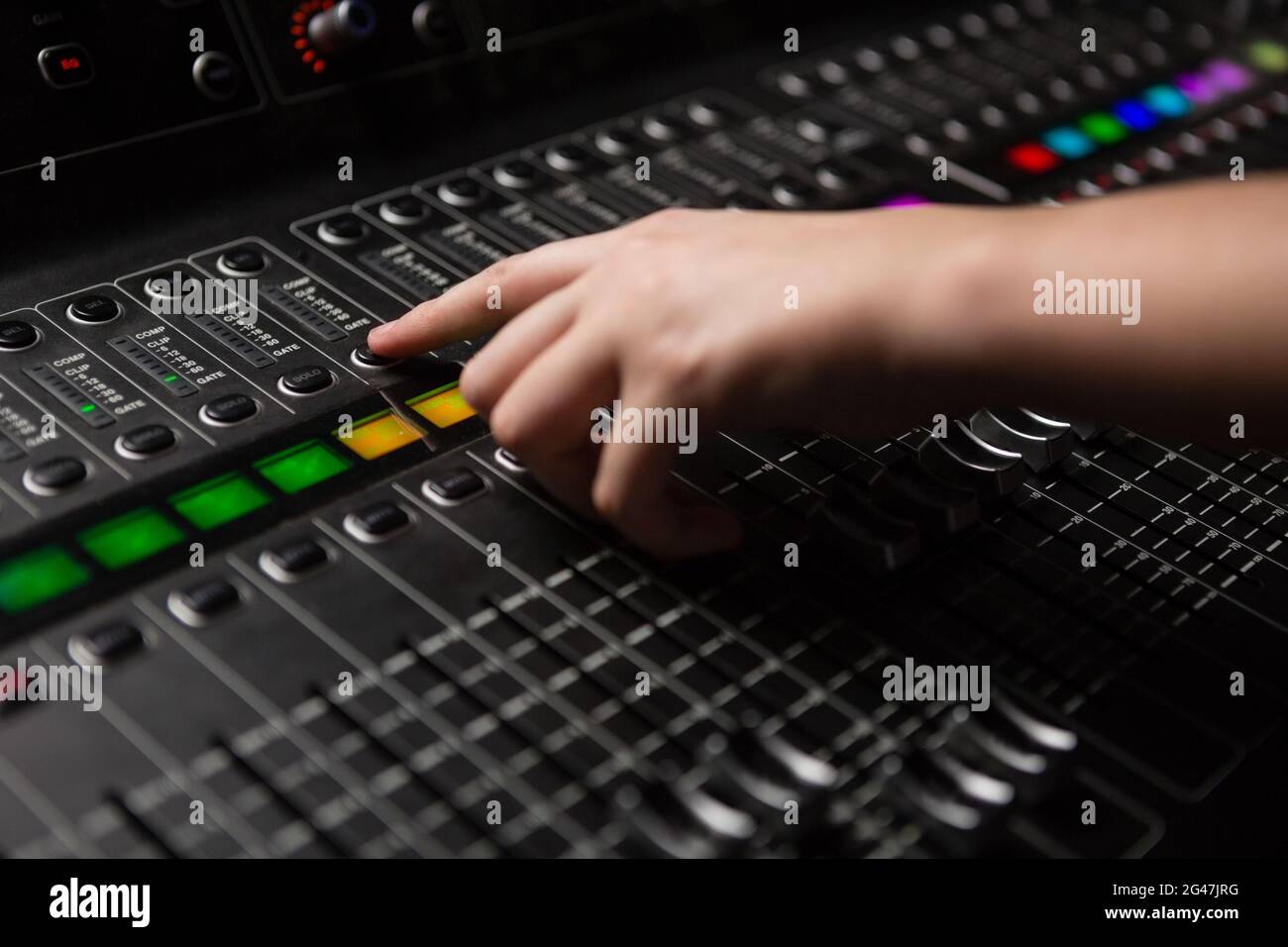 Hand of audio engineer using sound mixer Stock Photo Alamy