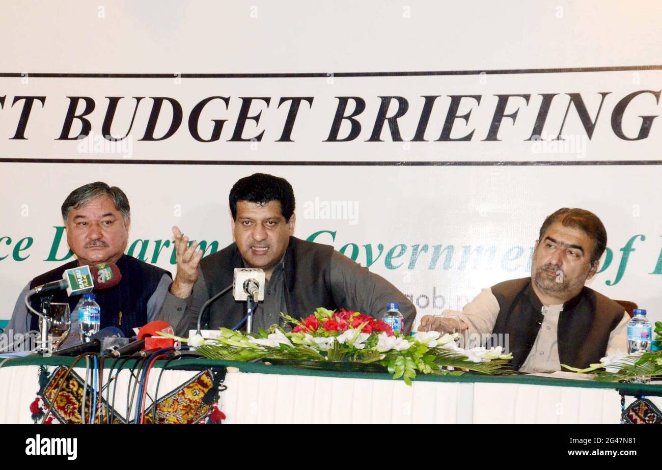 Balochistan Finance Minister, Mir Zahoor Ahmed Buledi along with others addresses to media persons during press conference regarding Post Budget 2021-22 held at Balochistan Assembly building in Quetta on Saturday, June 19, 2021. Stock Photo