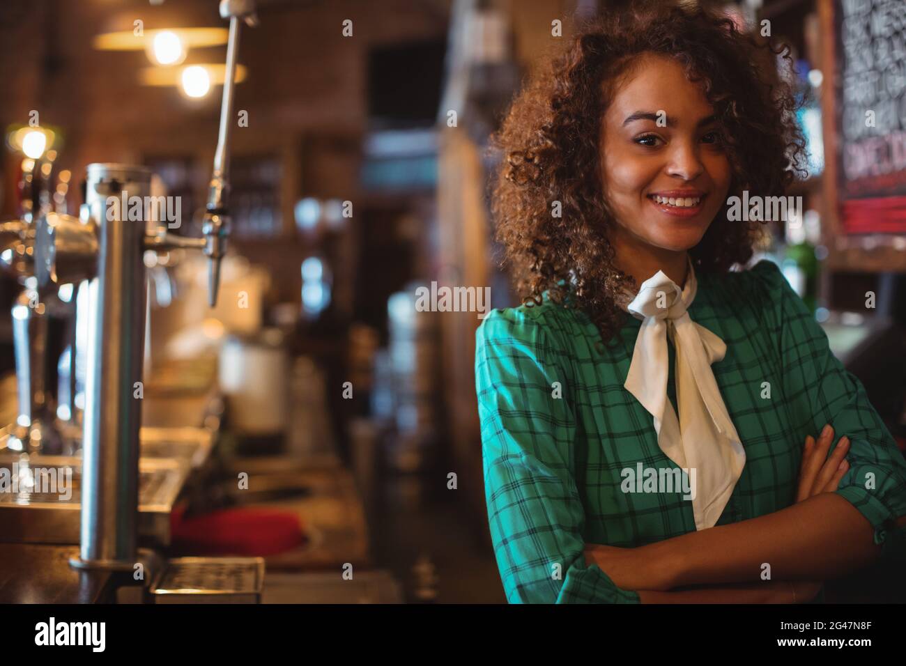Portrait waitress standing arms hi-res stock photography and images - Alamy