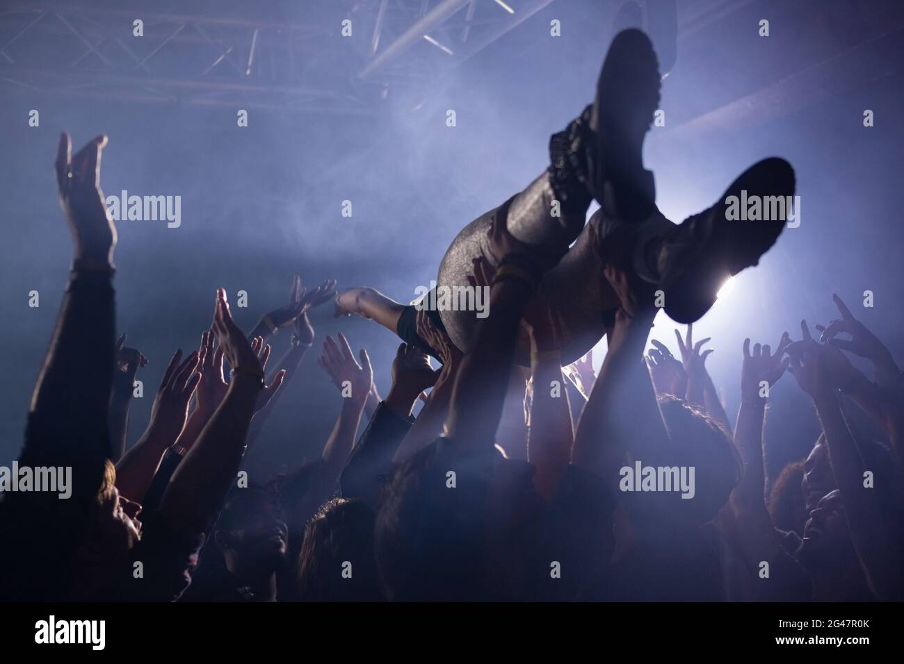 Crowd surfing at a concert Stock Photo Alamy