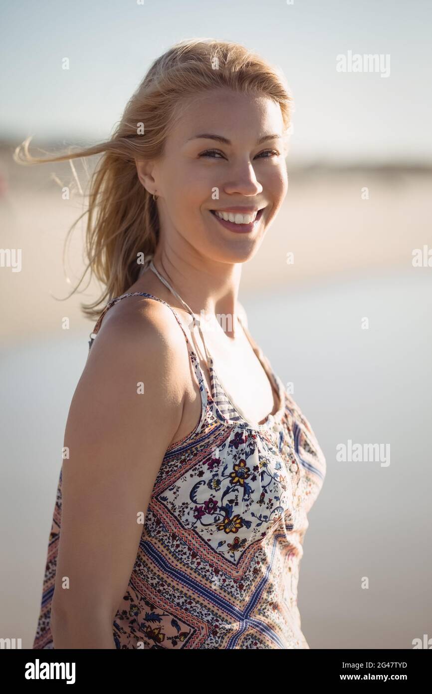 Portrait blond young woman camera beach hi-res stock photography and ...