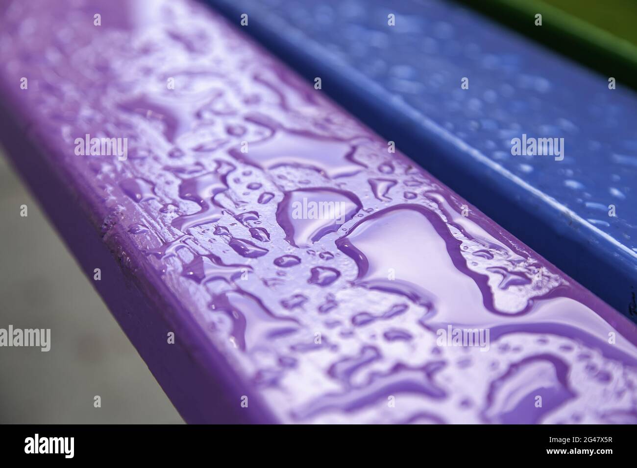 Detail of painted wood wet from rain Stock Photo Alamy