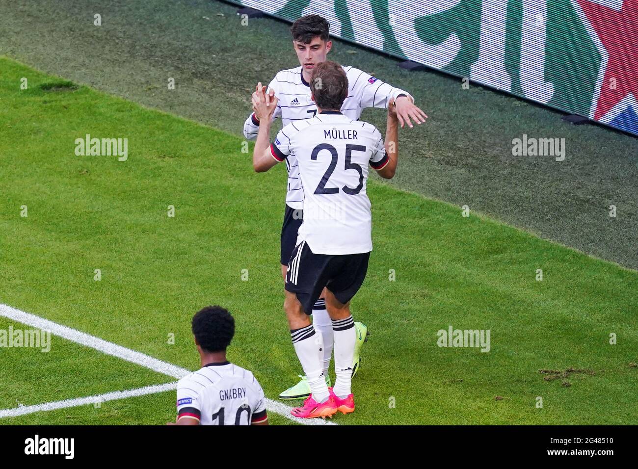 MUNCHEN, GERMANY - JUNE 19: Kai Havertz of Germany celebrates after scoring his sides first goal with Thomas Muller of Germany during the UEFA Euro 2020 Group F match between Portugal and Germany at Allianz Arena on June 19, 2021 in Munchen, Germany (Photo by Andre Weening/Orange Pictures) Stock Photo