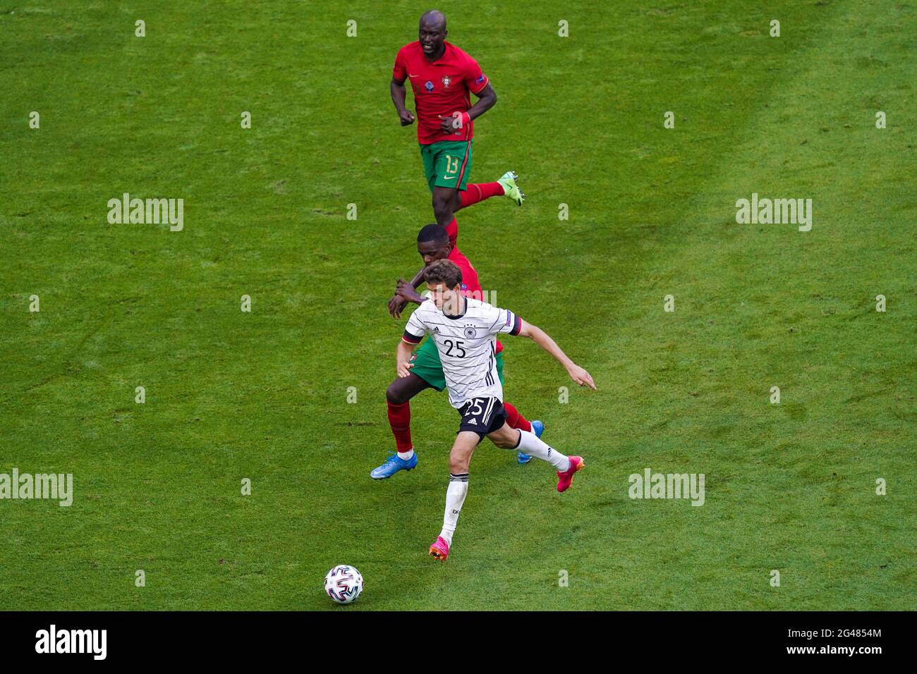 MUNCHEN, GERMANY - JUNE 19: Thomas Muller of Germany and William Carvalho of Portugal during the UEFA Euro 2020 Group F match between Portugal and Germany at Allianz Arena on June 19, 2021 in Munchen, Germany (Photo by Andre Weening/Orange Pictures) Stock Photo