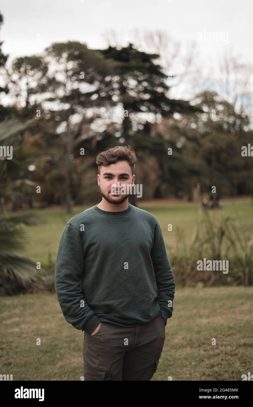 Portrait of a young Caucasian man in a park Stock Photo