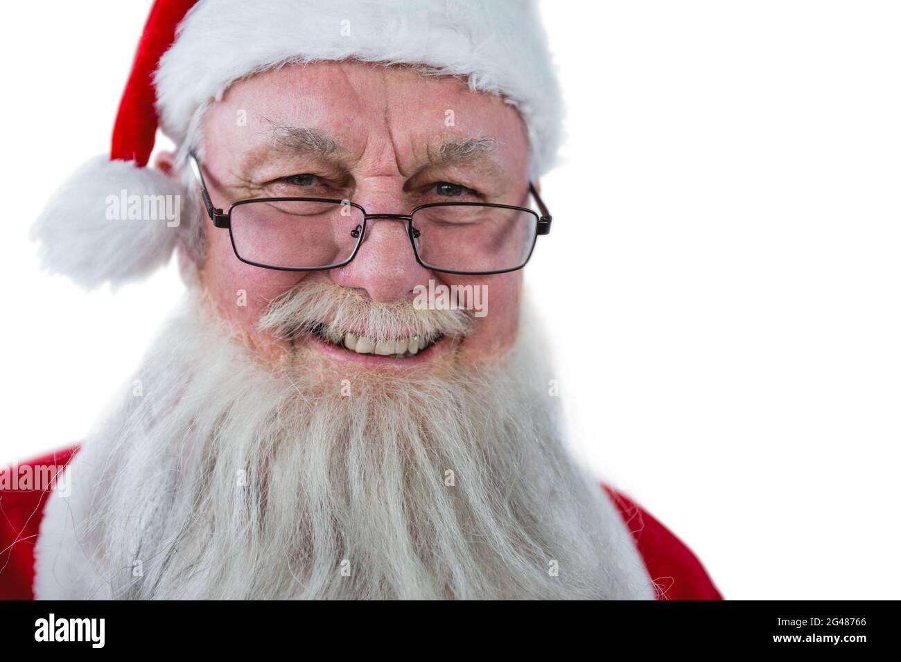 Santa Claus smiling against white background Stock Photo - Alamy