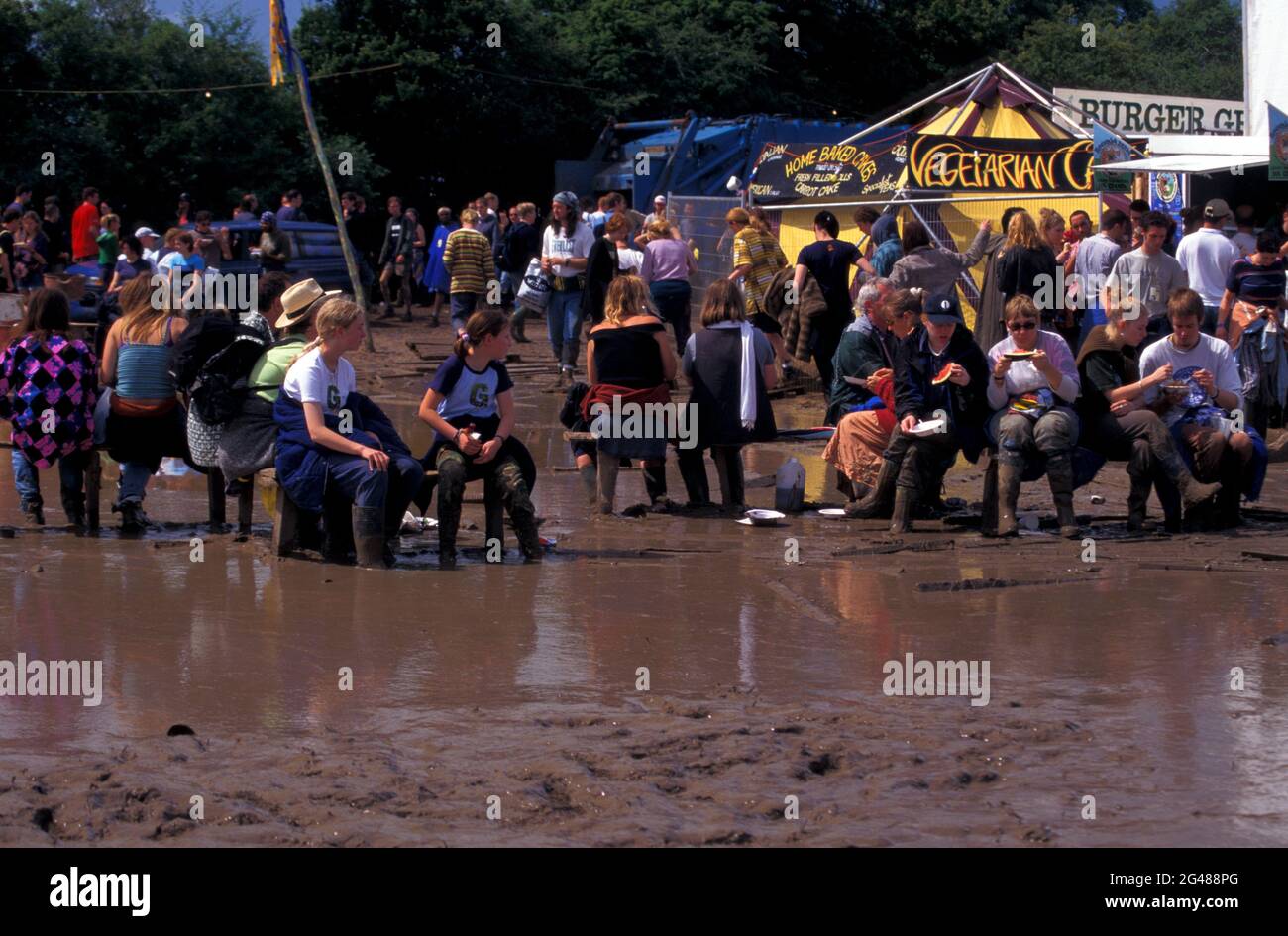 People on mud in Glastonbury 1998 festival, Pilton, Somerset, England Stock Photo