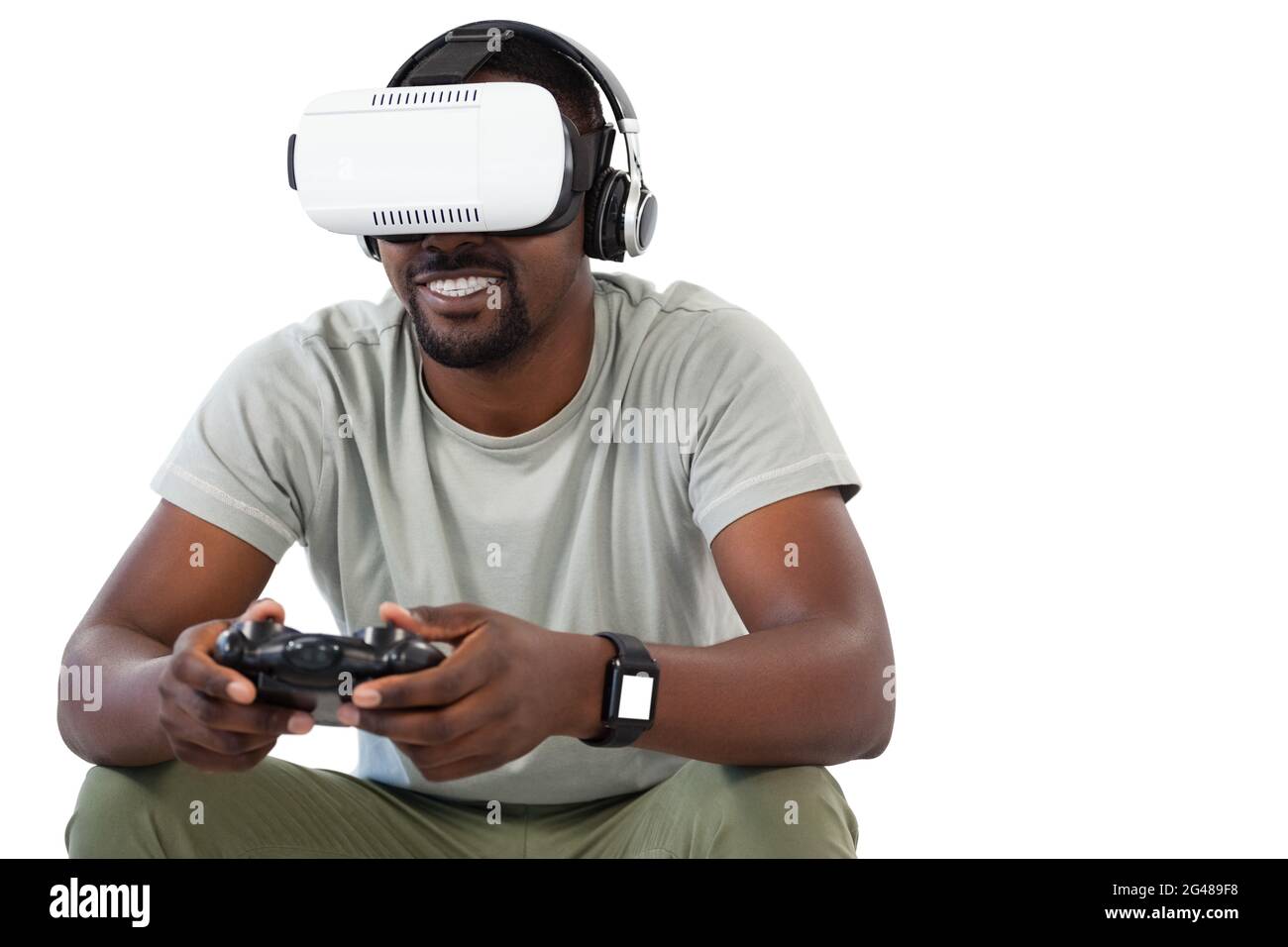 Man using virtual reality headset and playing video game Stock Photo