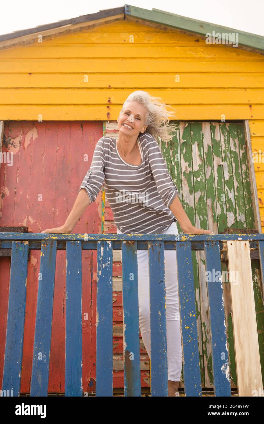 Leaning on wood railing hi-res stock photography and images - Alamy