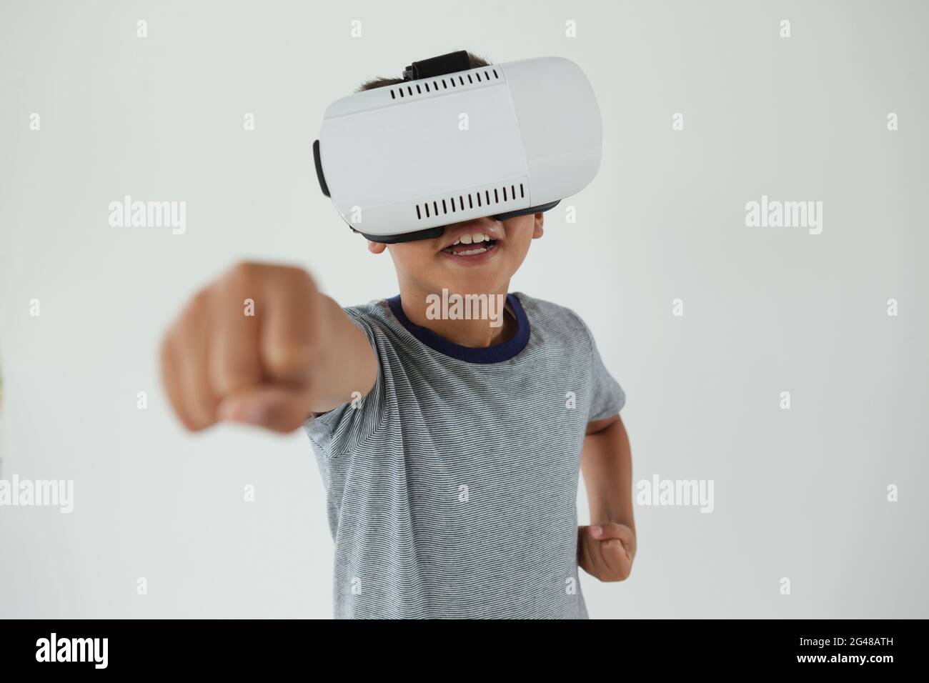 Schoolboy using virtual reality headset Stock Photo