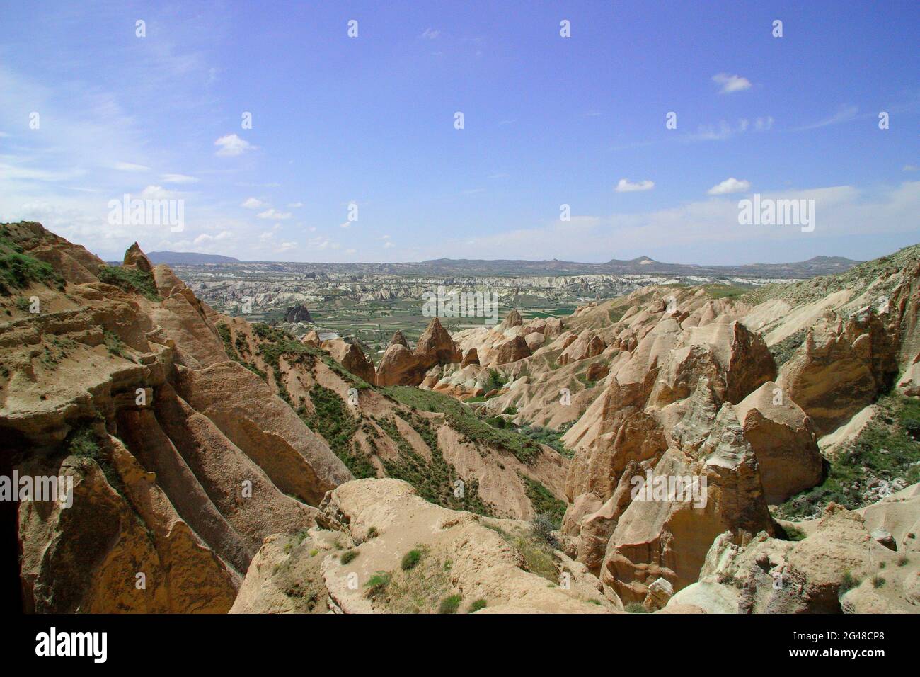 Cone-shaped rock formations in Cappadocia, Turkey Stock Photo - Alamy