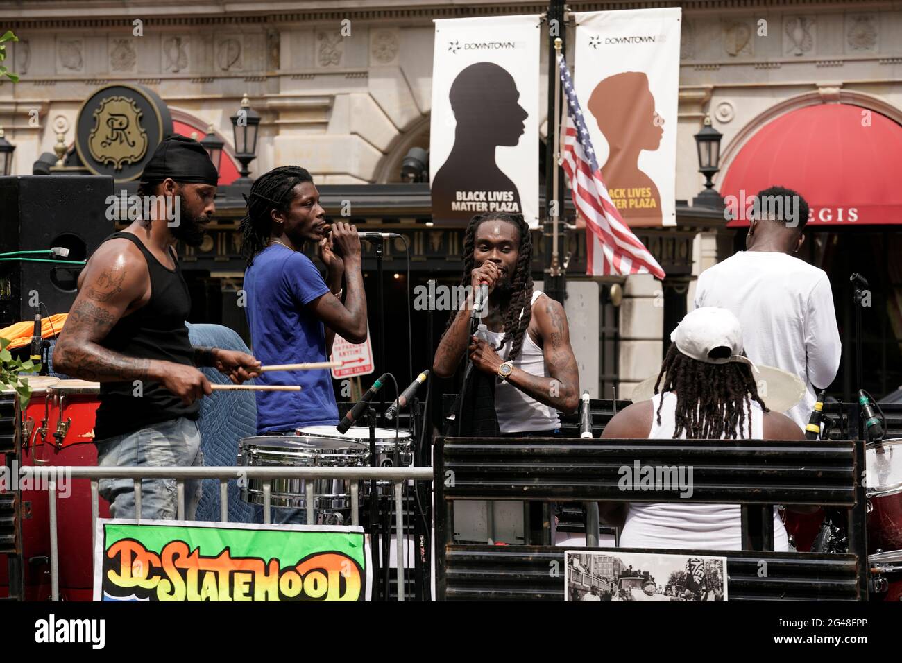 Band N2L performs as people celebrate Juneteenth, which commemorates the end of slavery in Texas, two years after the 1863 Emancipation Proclamation freed slaves elsewhere in the United States, at Black Lives Matter Plaza in Washington, D.C. U.S., June 19, 2021. REUTERS/Ken Cedeno Stock Photo