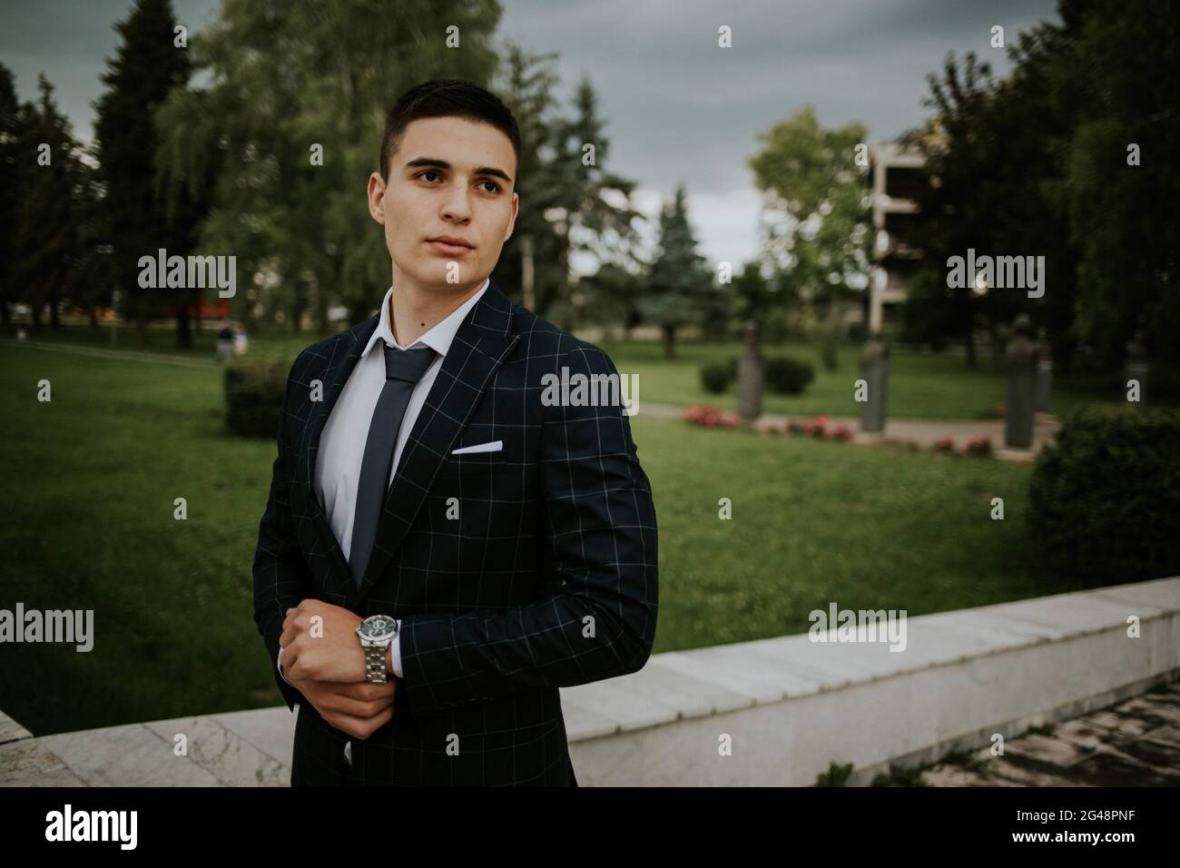 Caucasian young businessman in a suit and tie standing outdoor Stock ...