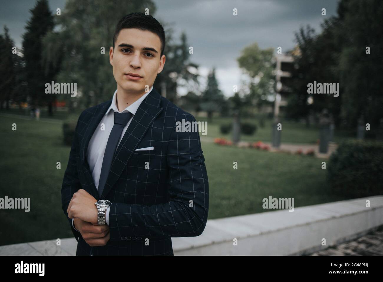 Caucasian young businessman in a suit and tie standing outdoor Stock ...