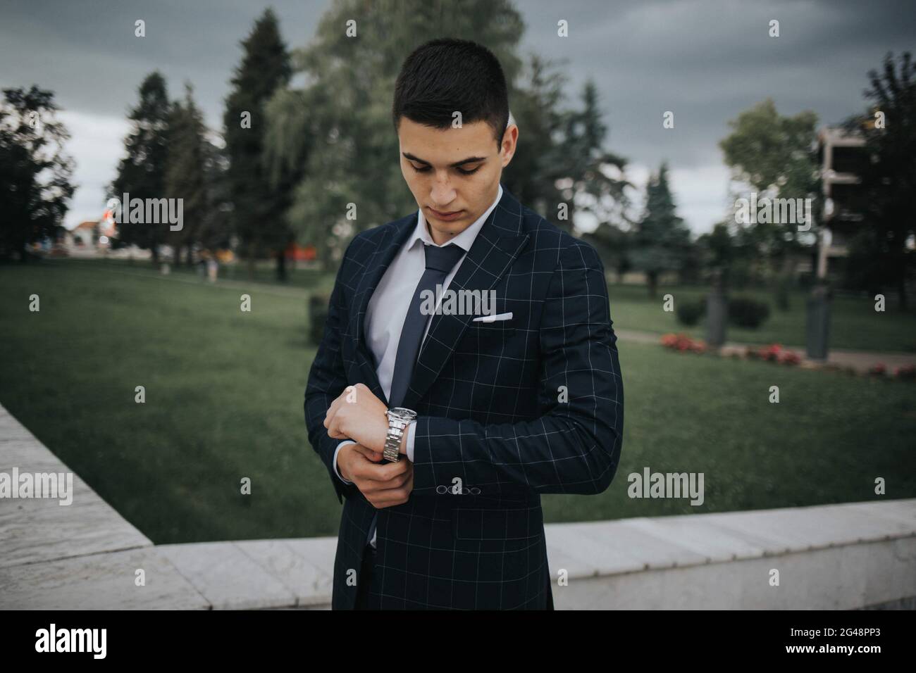 Caucasian young businessman in a suit and tie standing outdoor Stock ...