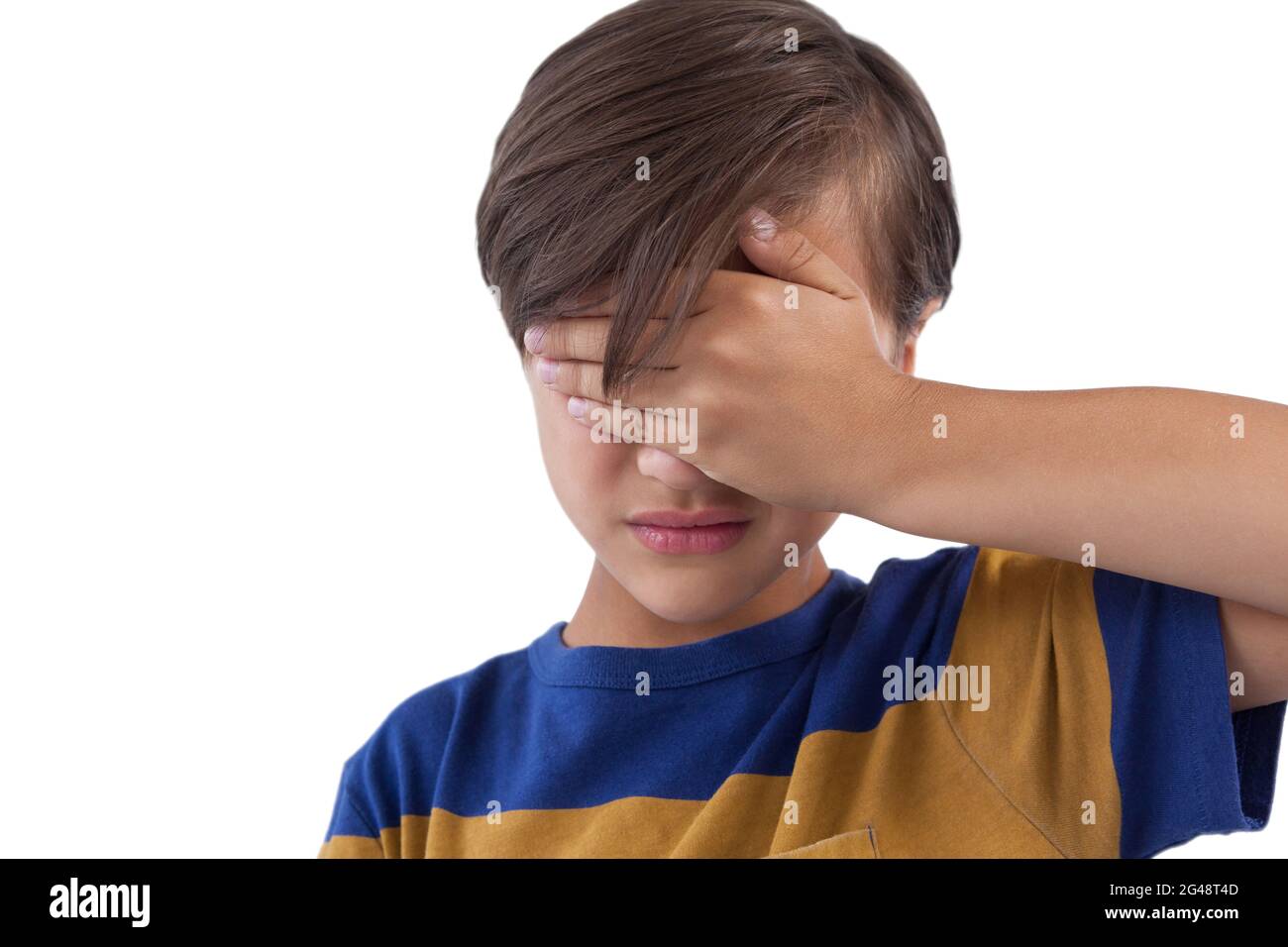 Cute boy covering his eyes Stock Photo - Alamy